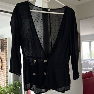 Black sheer blouse. Flattering fit for all!